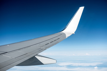 Sky and cloud seen from window of airplane