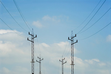Wall Mural - Power lines against blue sky