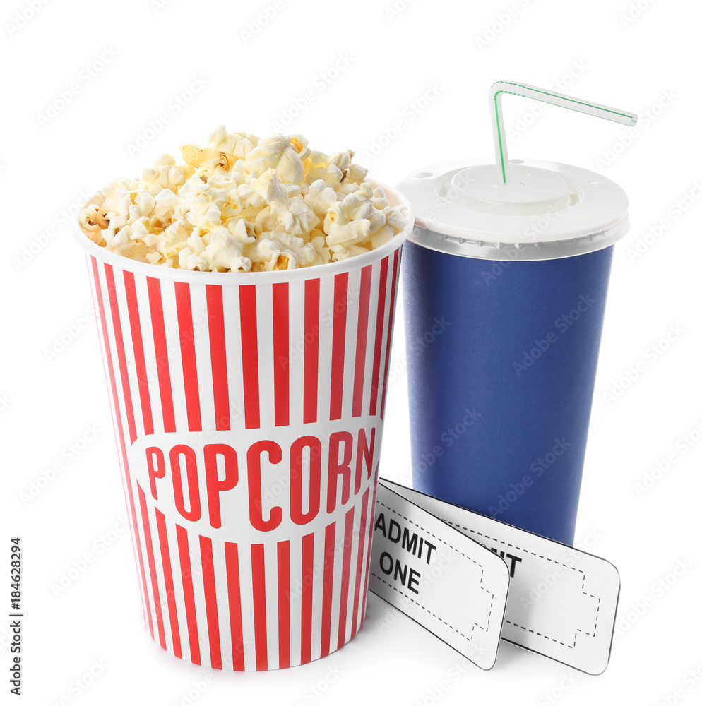 Cup with popcorn, soda and cinema tickets on white background