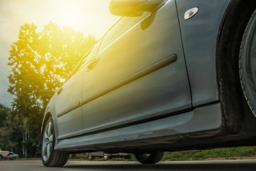 Wall Mural - Sports car side view, alloy wheels