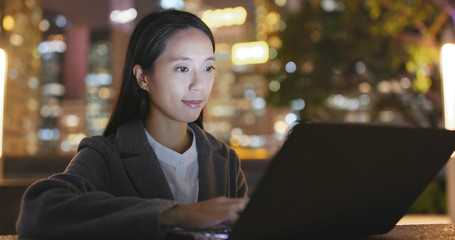 Sticker - Asian businesswoman work on laptop computer at night