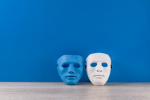Blue And White Mask On A Blue Background
