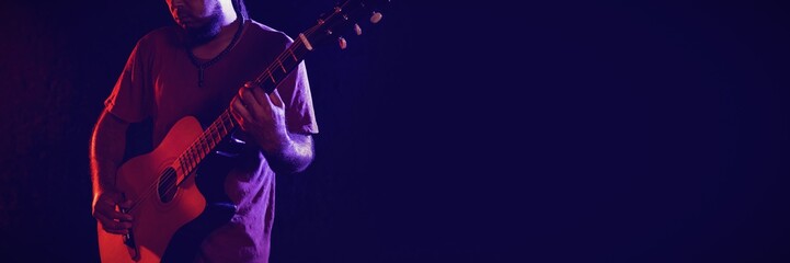 Guitarist performing in club