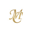 Initial letter MC, overlapping elegant monogram logo, luxury golden color