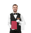 © Africa Studio - Handsome waiter with menu on white background