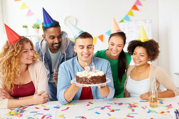 Wall Mural - team greeting colleague at office birthday party