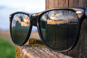 Sunset Reflecting in a Pair of Sunglasses