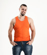 © yurolaitsalbert - portrait of a sporty guy - bodybuilder in jeans and orange t-shi