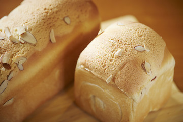 Wall Mural - Loaf of bread with almond nut slices 