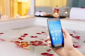 Canvas Print - smart phone with smart home with modern bathroom