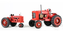 Two Red Toy Tractors