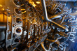 © Alexander - Gas turbine engine of feed gas compressor located inside pressurized enclosure, The gas turbine engine used in offshore oil and gas central processing platform.
