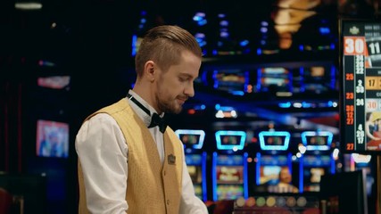 Wall Mural - Dealer cleaning table in a casino