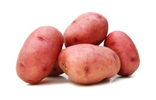 Close Up Of Two Red Potatoes Against White Background. 