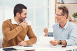 © Sergii - Two business men together in the office