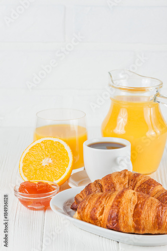 Freshly Baked Croissant Orange Juice Fresh Fruits Jam On White