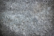 Gray metal texture in scratches and abrasions