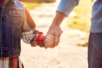 Grandfather and grandson together outdoors family concept