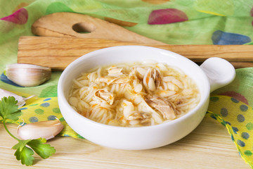 Wall Mural - garlic soup with noodles and chicken