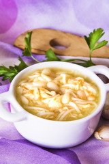 Wall Mural - garlic soup with noodles and chicken