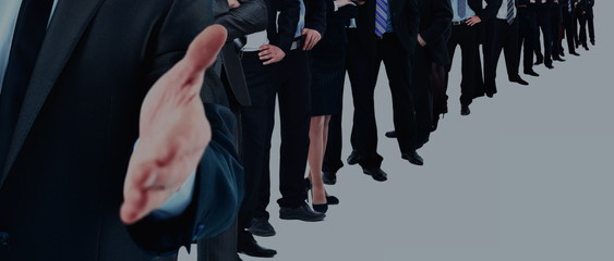 Wall Mural - Business group in a row. leader with open hand and ready to shake your hand