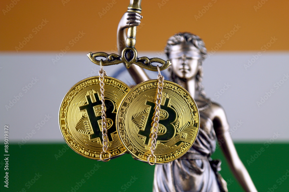 Symbol of law and justice, physical version of Bitcoin and India Flag. Prohibition of cryptocurrencies, regulations, restrictions or security, protection, privacy.
