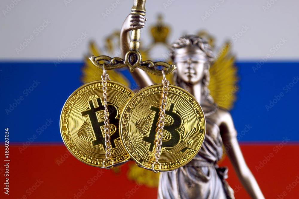 Symbol of law and justice, physical version of Bitcoin and Russia Flag. Prohibition of cryptocurrencies, regulations, restrictions or security, protection, privacy.