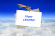 Kartka Happy Christmas nad chmurami i błąkitnym niebem.