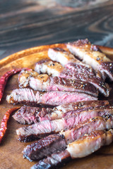 Canvas Print - Cut beef steak on the wooden board