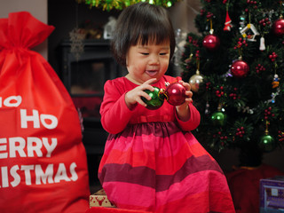 happy girl celebrating Christmas at home