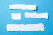 © adragan - Pieces of white paper template for text on a blue background. Mock-up