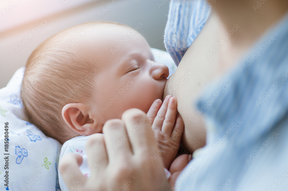 breastfeeding for newborns motherhood concept. helpful tips for feeding the baby. love and tenderness. - obrazy, fototapety, plakaty 