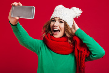 Poster - Beautiful young woman make selfie by phone.