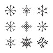 © souloff - Set of hand drawn snowflakes. Delicate snow icon silhouettes. Vector illustration with editable strokes. Isolated on white background. Design elements for christmas, seasonal greetings, or any use.