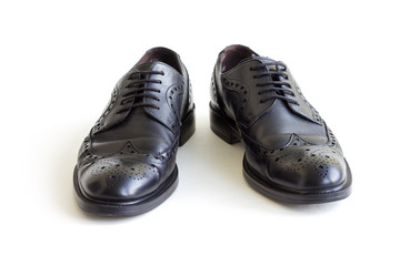 black classic men's shoes on a white background