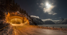 View Of Illuminated Tunnel Against Sky During Winter