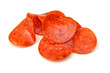 Clices of pepperoni on white background