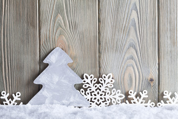 Sticker - Christmas background - snowflakes and tree on snow and wooden wall