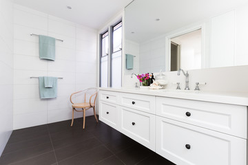 Beautiful white contemporary classic styled clean white bathroom