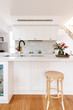 Hamptons styled kitchen with marble herringbone splash back