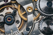 © Ilya/Stocksy - Mechanical clock mechanism in motion macro
