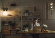 © Lumina/Stocksy - Businesswoman Working Late at Her Office