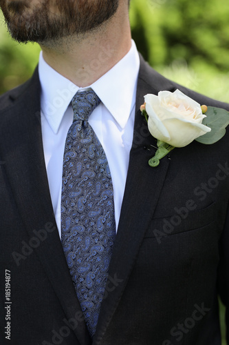 black suit blue tie wedding