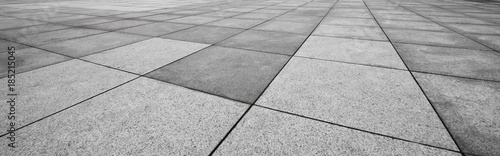 Cuadros en Lienzo Perspective View of Monotone Gray Brick Stone on The Ground for Street Road