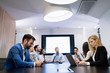 © NDABCREATIVITY - Picture of businesspeople having meeting in conference room