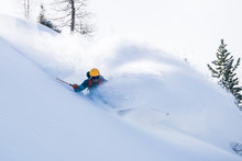 A Male Skier Does Off-piste Skiing In Fresh Powder Snow In The Sportgastein Ski Area In Austria.