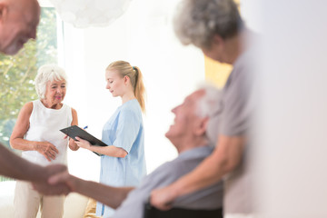 Wall Mural - Nurse sharing information with patient