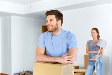 Wall Mural - happy couple with boxes moving to new home