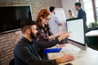 © NDABCREATIVITY - Portrait of young designers working on computer