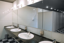 Modern Interior With Mirrors In Public Toilet
